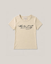 Alabaster Baby Tee in Creme mit Schriftzug What they call waste heaven calls worship, Produktansicht